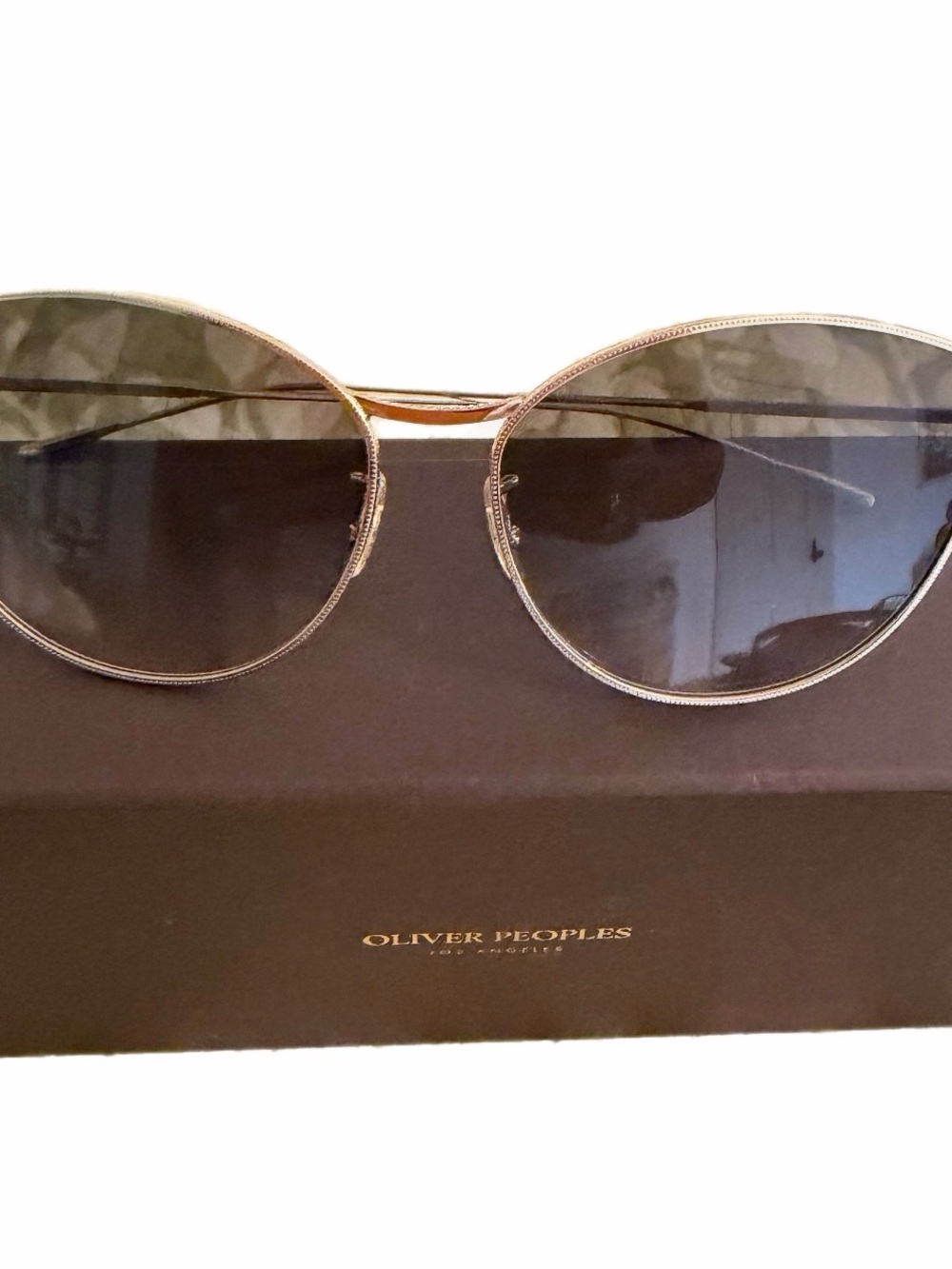 Oliver Peoples Gold Frame Sunglasses with Gray Lenses